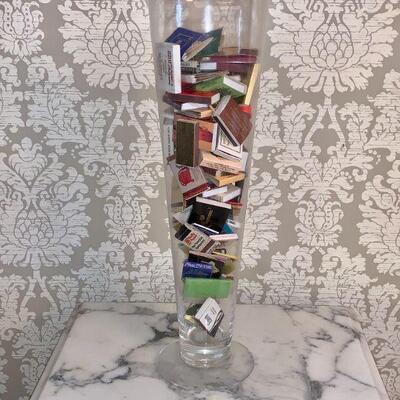 LOT 235 VINTAGE MATCH BOOKS IN TALL GLASS VASE