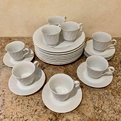 LOT 258  PARTIAL SET OF WHITE FINE CHINA DISHES SWIRL PATTERN 