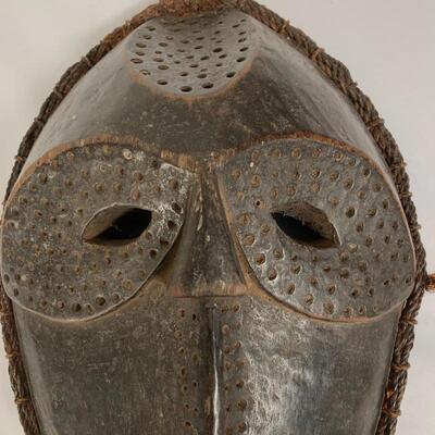 Lot 126 - Pair of Round African Masks
