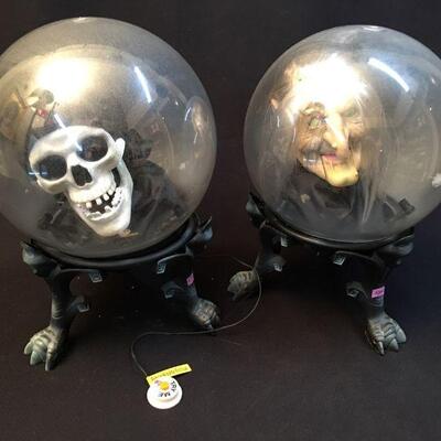 Two Spooky battery powered talking Globes with a skull and a witches head