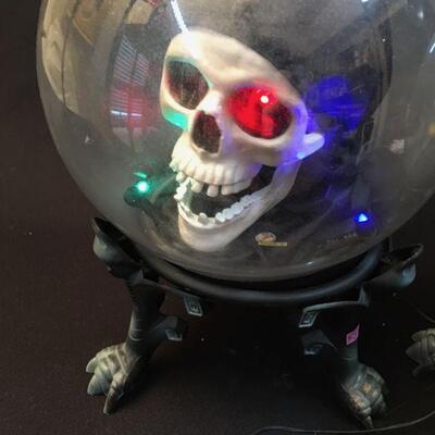 Two Spooky battery powered talking Globes with a skull and a witches head