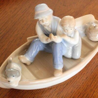 Lot 50 Grandfather/Grandson Fishing in Ceramic Boat