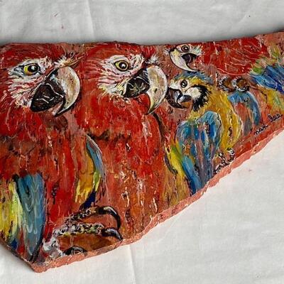 Lot #256 Nan Leeâ€™s Peaceable Kingdom Parrots and Mackaw  Painting on Red Travertine