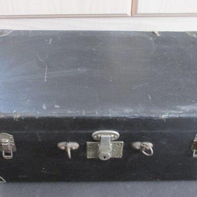 Lot 176- Vintage Black Wood Traveling Trunk