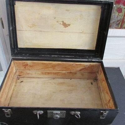 Lot 176- Vintage Black Wood Traveling Trunk
