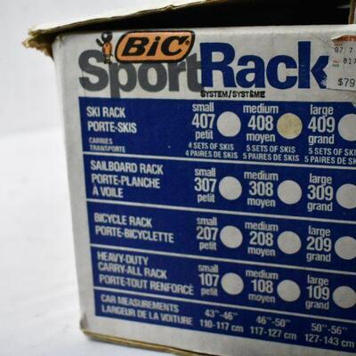 Medium Ski Rack by Bic. 2 slips broken. Still useable