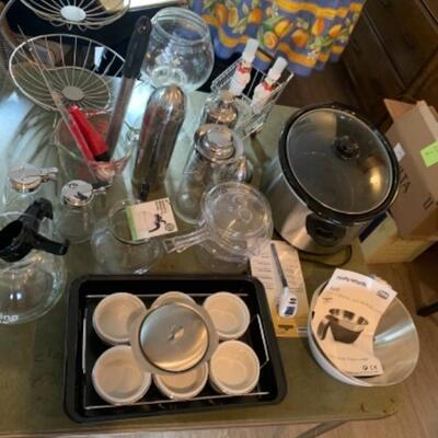 Lot 2.  Cocktail shakers (metal and glass), glass coffee carafes, syrup pitchers, Hamilton Beach crock pot, Cory percolator, Morphy...