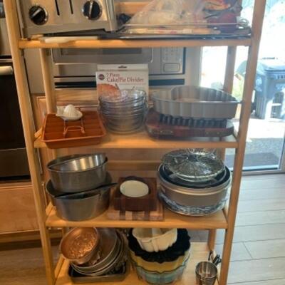 Lot 10. Assorted gourmet bakeware (cake pans, forms, muffin pans, Bundt pans),Cuisinart toaster, turkey prep kit etc.--$75