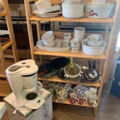 Lot 11. Assorted mugs, porcelain ramekins, soufflÃ© dishware, Cuisinart coffee maker, etc.â€”$85