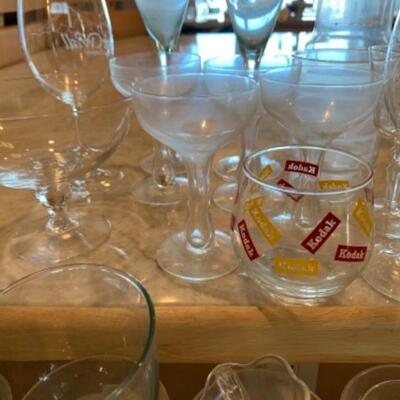 Lot 13. Large assortment of glassware (sundae, mugs, parfait, cocktail), etc.â€”$45