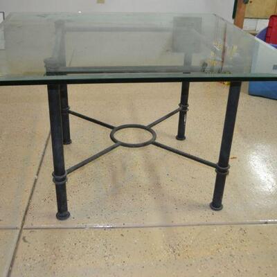 LOT 133  GLASS TABLE WITH METAL BASE