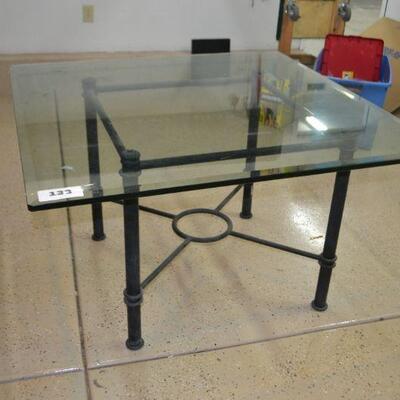 LOT 133  GLASS TABLE WITH METAL BASE