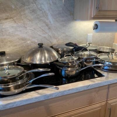 Lot 15. Large collection of Calphalon cookware (never used)--$325
