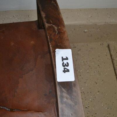 LOT 134 LEATHER AND WOOD CHAIR AS-IS