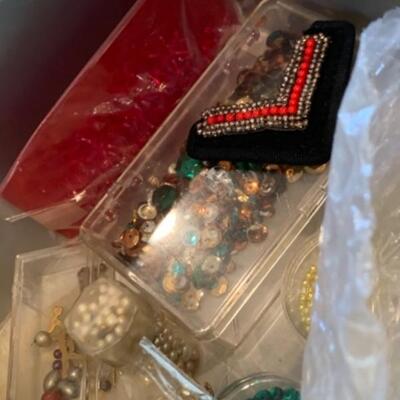 Lot 24. Assortment of costume jewelry, key chains, beads--$15
