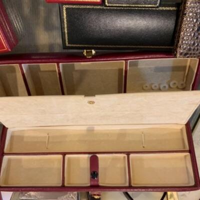 Lot 39. Assorted leather jewelry boxes, ring boxes, business card holders, antique opera glasses, frames, etc.--$75