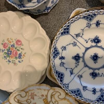 Lot 42. Large collection of ceramics, cups and saucer, deviled egg dishes, ramekins, Royal Copenhagen cup and saucers, dessert plates--$150