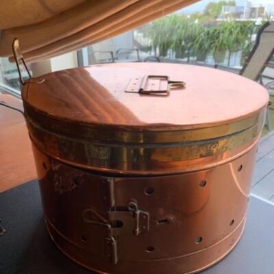 Lot 47. Large round vented copper box , copper bed warmer, copper bonsai tree sculpture, large copper pot, barometer, brass and copper...