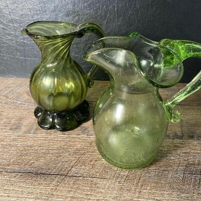 57: Collection of Blown Green Glass Pitchers