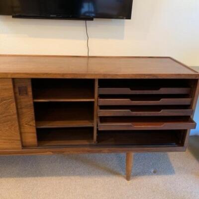 Lot 51. J. L Moller mid-century walnut credenza with trays and shelves. Measurements: 83â€ wide, 30â€ high, 19â€ deep--$1200