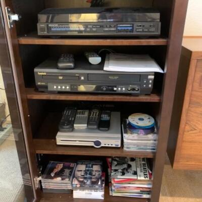 Lot 55. Stereo cabinet with Kenwood record player, DVD/VHS player by Symphonic--$95