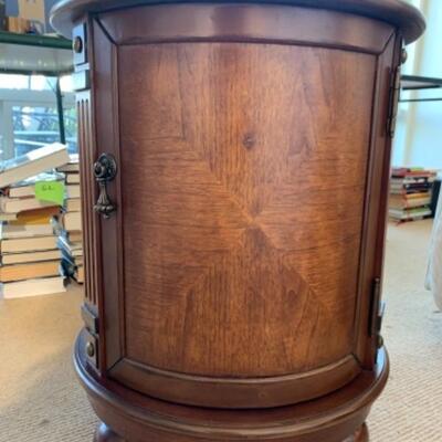 Lot 84. Occasional round cabinet, 18 inches in diameter, 24 inches high with geometric design--$45
