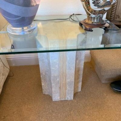Lot 86. Glass top coffee table--$35