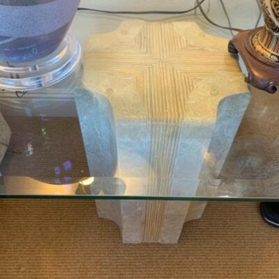 Lot 86. Glass top coffee table--$35