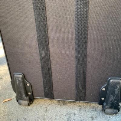 Lot 104. Two soft suitcasesâ€”one Globetrotter, one Envy in excellent condition--$35