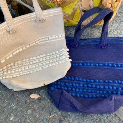 Lot 108. Duffle bag, wicker bag and two canvas totes--$25