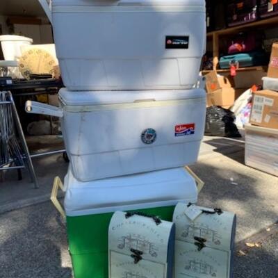 Lot 111. Three coolers, two wine holders and one hat--$35