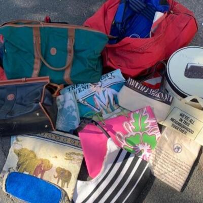 Lot 114. Large collection of totes and travel bags, hat boxâ€”Ralph Lauren and Andantini leather tote--$35 