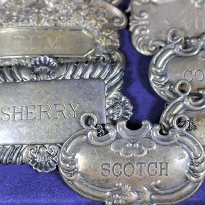 LOT#326: Marked Sterling Bottle Tags