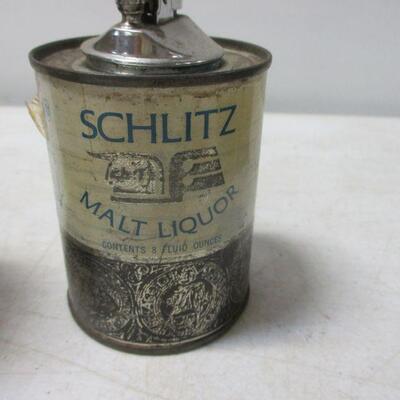 Lot 70 - Rare! Vintage Advertising Items includes Commonwealth Coin Bank, Schlitz Lighter, and More