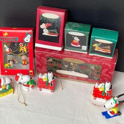 Lot #280 Hallmark Keepsake Snoopy and Woodstock Ornaments with Table Top Display