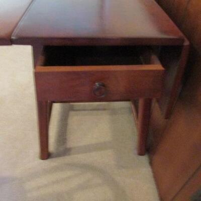 LOT 99  ANTIQUE REDWOOD DROP LEAF TABLE WITH DRAWER  