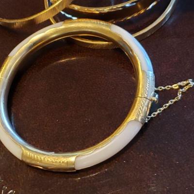 Lot 113: Bracelet lot (4 Bangles & 1 Cuff)