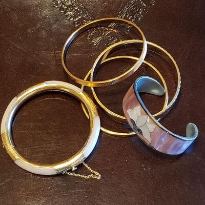 Lot 113: Bracelet lot (4 Bangles & 1 Cuff)