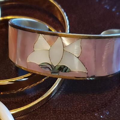 Lot 113: Bracelet lot (4 Bangles & 1 Cuff)