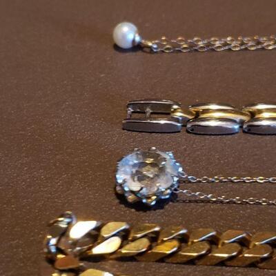 Lot 115: Necklaces, Watch, and Bracelets lot