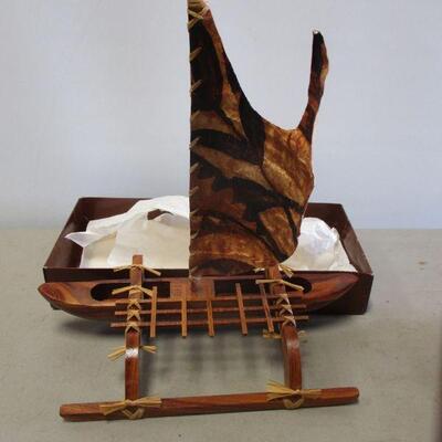 Lot 161 - Vintage Hawaiian Outrigger Canoe in Original Box with Sail