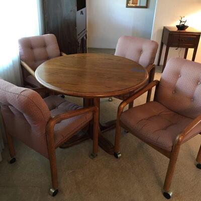 Vintage Wood Oak Table With Matching Chairs on Casters (`108)