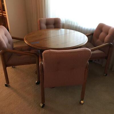 Vintage Wood Oak Table With Matching Chairs on Casters (`108)