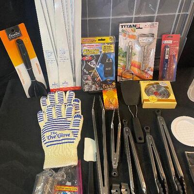 Lot 73 - Kitchen Items (Oven glove, cookie cutters, atomic lighter, thongs, Titan cheese slicer and much more!)