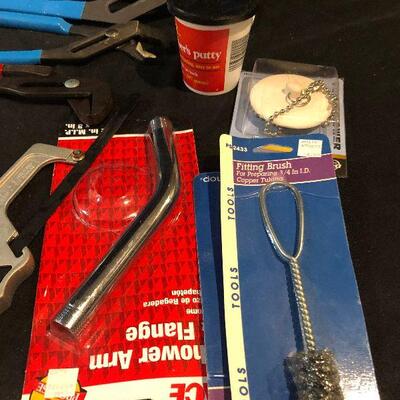 Lot 95 - Hand Tools ( hacksaw, heat shield, PVC cutter, tape measure, AWP bag, various cutters, large wrenches, sleeve puller, small saws...