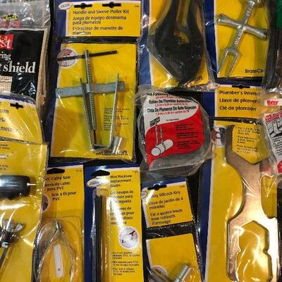 Lot 95 - Hand Tools ( hacksaw, heat shield, PVC cutter, tape measure, AWP bag, various cutters, large wrenches, sleeve puller, small saws...