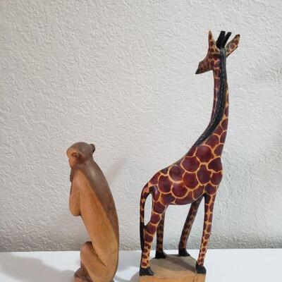 Lot 56: Handcarved Wood Giraffe and Monkey