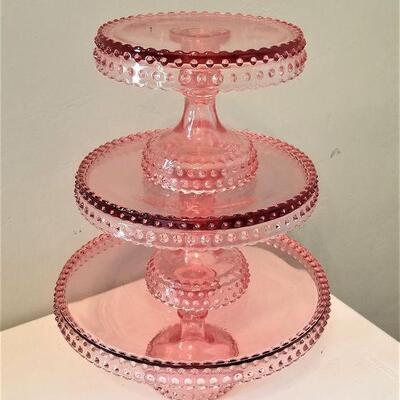 Lot #37  Set of three Pink Glass Cake Plates