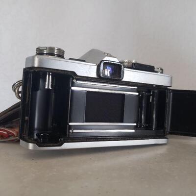 Lot 136: Olympus 35mm Camera with Strap