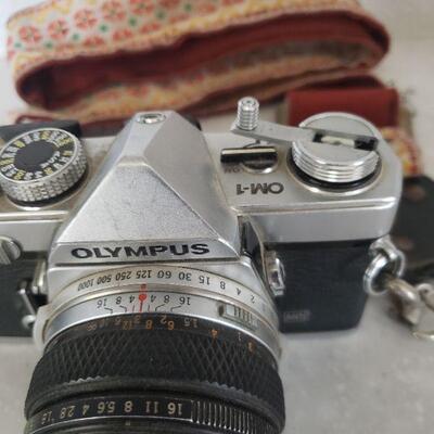Lot 136: Olympus 35mm Camera with Strap